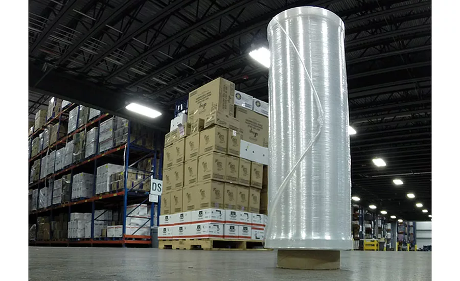 Roll of stretch wrap in front of pallet