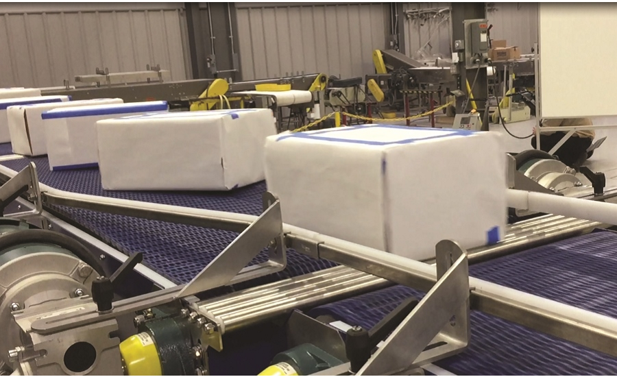 Multi-Conveyor builds mild steel constructed belt product turner conveyor system