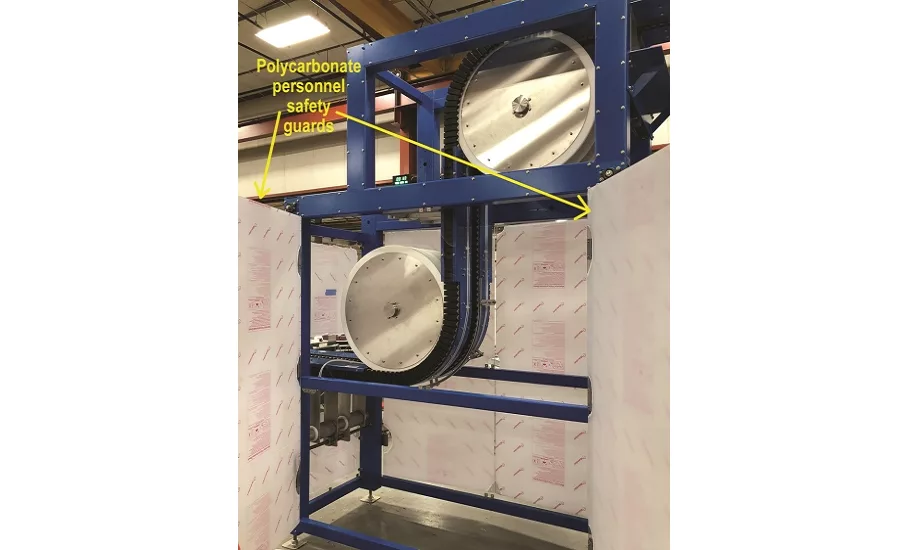 Side Grip Elevator Transports Filled & Capped Bottles to Over 7' Elevation