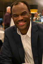 A person smiling for the camera

Description automatically generated with medium confidence
