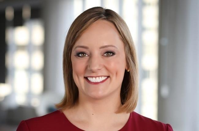 A close-up of a person smiling

Description automatically generated