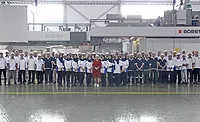 CPI Workers with BOBST Flexo Press.png