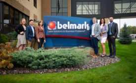 Belmark employees standing outside company headquarters
