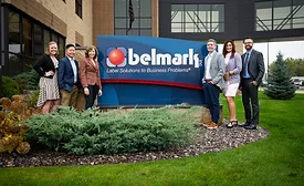Belmark employees standing outside company headquarters