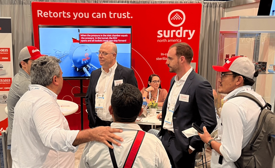 Representatives of Surdry North America presenting retort solutions at a trade show