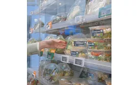 Image of salad bowls in a refrigerated case