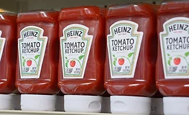 Heinz ketchup bottles on a retail shelf