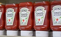 Heinz ketchup bottles on a retail shelf