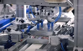 Image of Pack-Smart’s Tray Forming and Filling System in action.