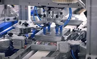 Image of Pack-Smart’s Tray Forming and Filling System in action.