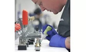 Sur-Seal employee working in lab
