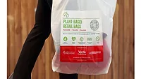 Image of someone carrying a biodegradable shopping bag