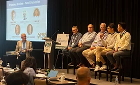 Panelists-speaking-at-27th-IMFA-Conference.png