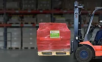 Forklift carrying SupplySentry labeled shrink wrap.png Forklift-carrying-SupplySentry-labeled-shrink-wrap.png
