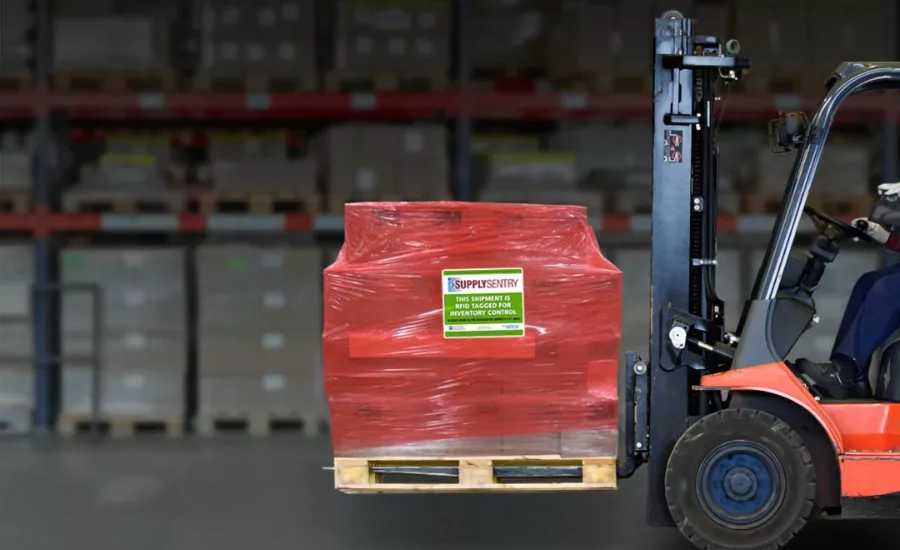Forklift-carrying-SupplySentry-labeled-shrink-wrap.png