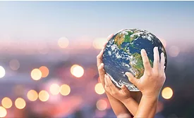 Hands-holding-globe-(Quadpack).png