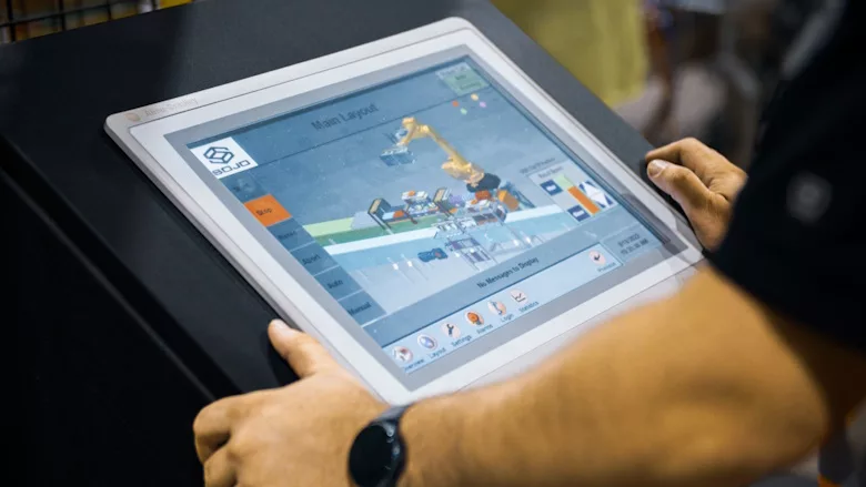 Person using Sojo software on computer tablet
