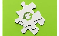 Image of recycling icon on a puzzle piece