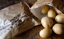 Riverford-potatoes-in-Parskide-packaging.png