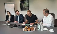 People consulting at conference table