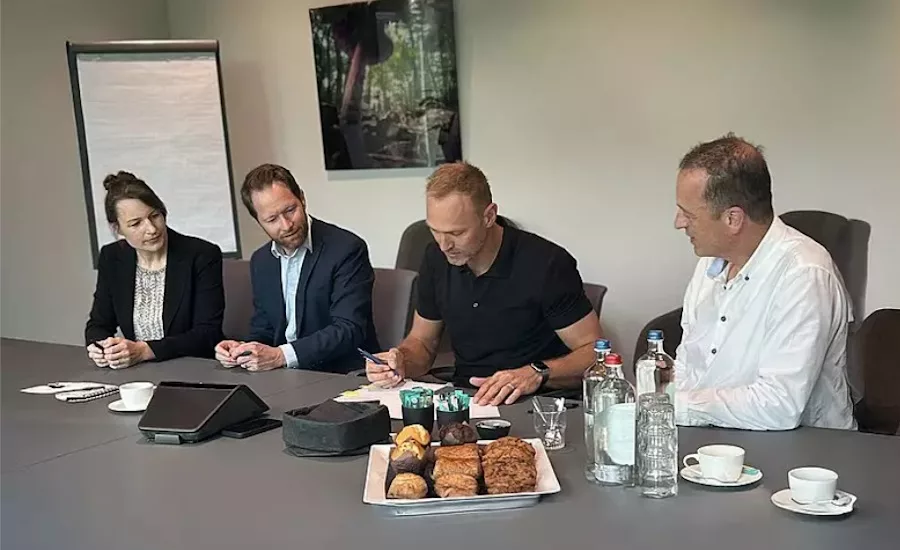 People consulting at conference table