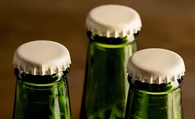 Image of bottles with white caps