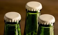 Image of bottles with white caps