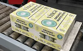 Multi-pack cases of canned Vinca white wine coming off the line