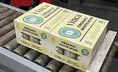 Multi-pack cases of canned Vinca white wine coming off the line