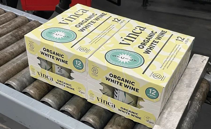 Multi-pack cases of canned Vinca white wine coming off the line