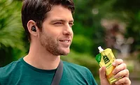 Man-holding-ALCA-spouted-pouch.png