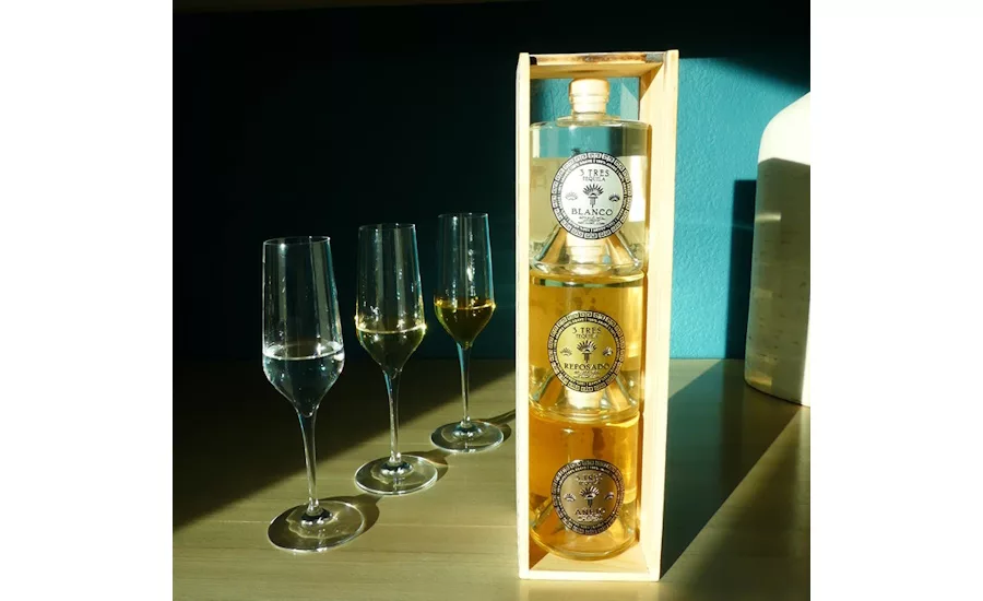 Image of stackable 3 Tres Tequila bottles