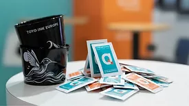 Image of sugar packets employing GIO-compliant inks on the outer package.