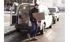 Courier delivering a package in cold weather