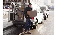Courier delivering a package in cold weather