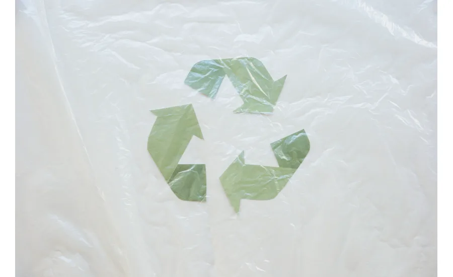Image of recycle symbol on flexible material