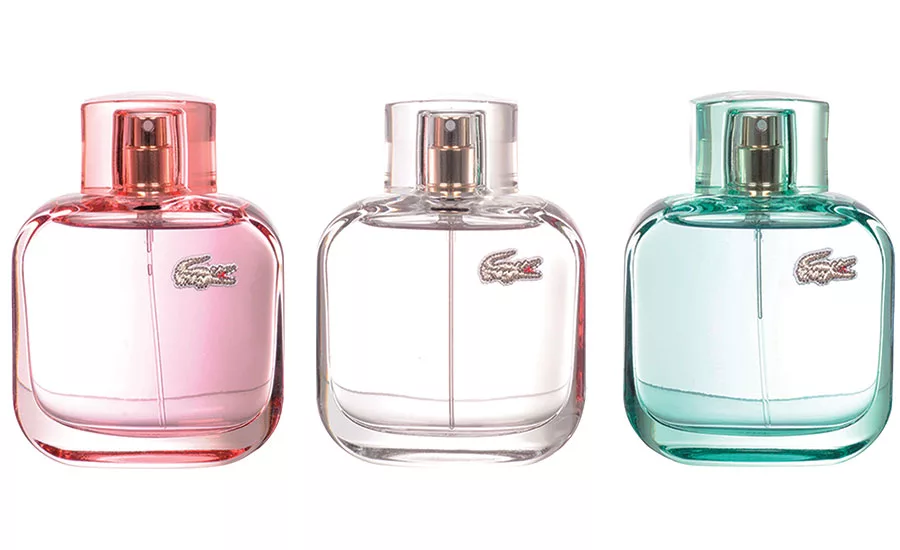 LaCoste's alligator is back on the perfume bottles of three new scents