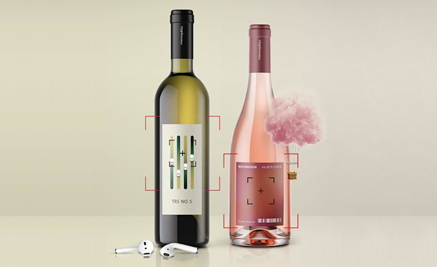 Two wine bottle labels with integrated QR codes and a pair of wireless earbuds.
