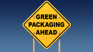 Yellow traffic sign with "Green Packaging Ahead" on blue sky background
