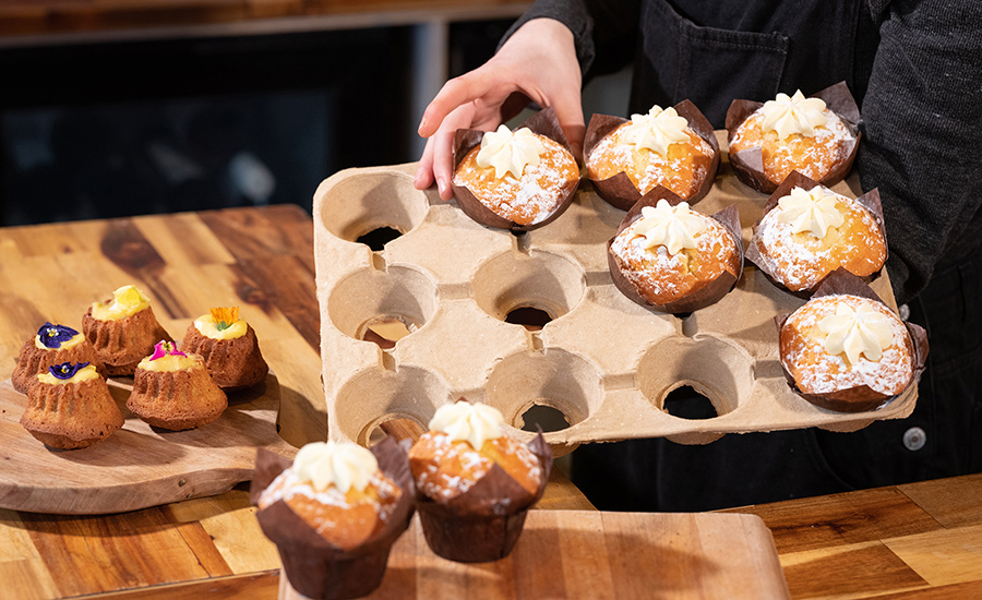 The molded fiber muffin tray developed by Cullen that allows the product to be made in the bakery and then displayed in the store – all in the same tray.
