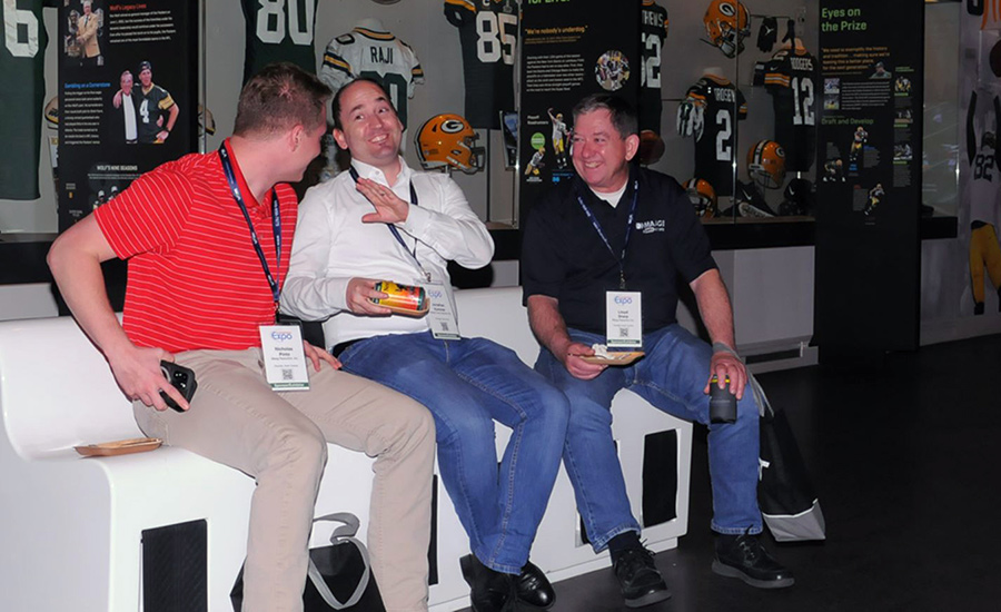 Attendees with Packers Display