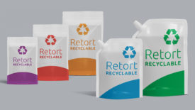 Five recyclable retort pouches in different packaging colors, two with attached drinking straw.
