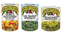 Examples of McCall Farms canned vegetables, including canned green beans, canned spinach, and canned succotash.