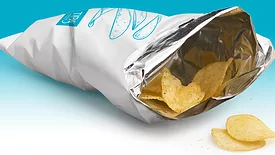 Potato chips in an opened TIPA package against a white background.