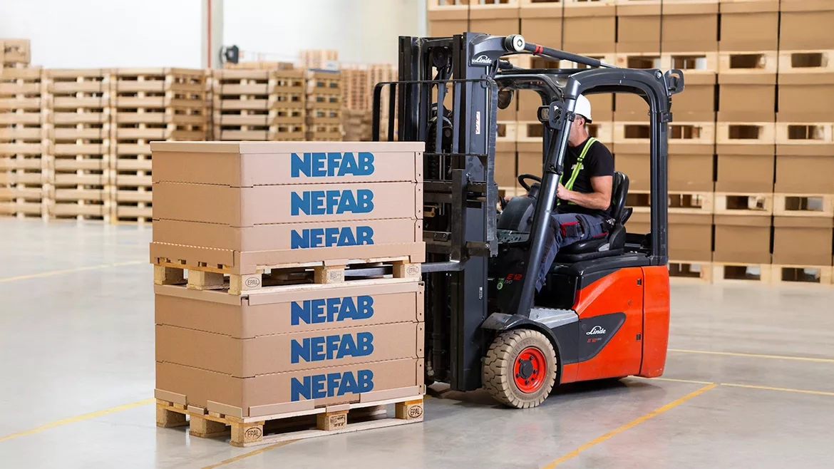 Forklift operator loading pallet with Nefab EdgePak Collar
