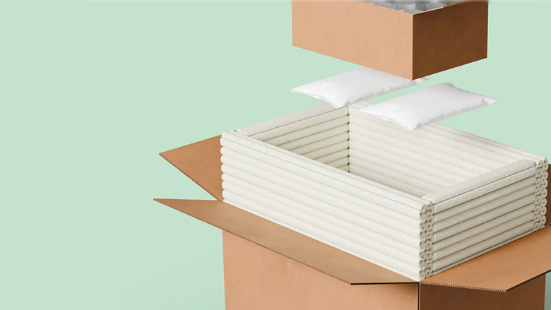 Image of TemperPack’s Green Cell Foam being pulled out of a corrugated carton.