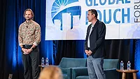 Global Pouch Forum TIPA Jared Damman of WildKind Packaging and Rodrigo Castaneda of TIPA Compostable Packaging making their presentation on compostable packaging at Global Pouch Forum.