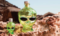 Outerspace Vodka is packaged in a highly distinctive green glass alien head package