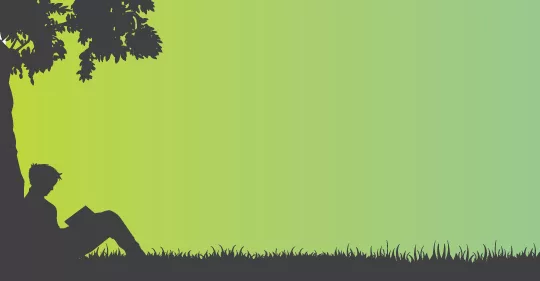 boy reading next to a tree graphic