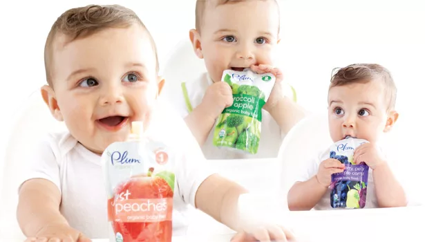babies eating plum pouches food
